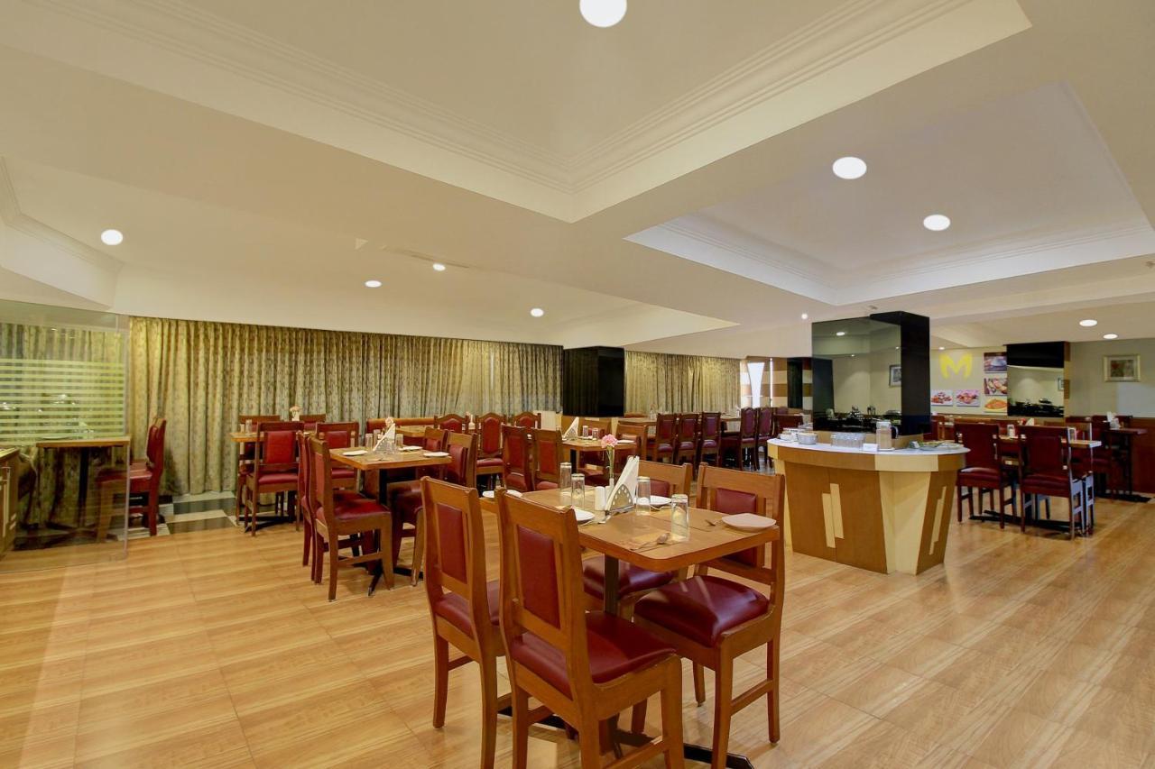 Monarch Brigade Road Hotel Bangalore Bagian luar foto