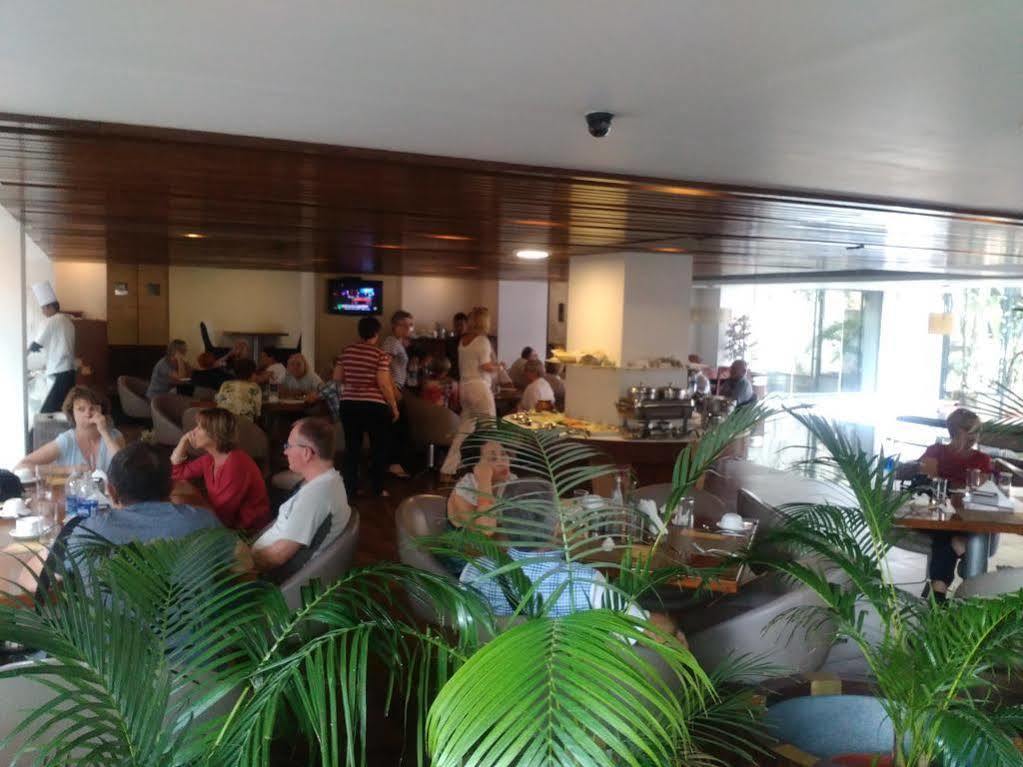 Monarch Brigade Road Hotel Bangalore Bagian luar foto